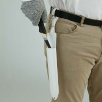 Knife scabbard provides easy access to one knife.